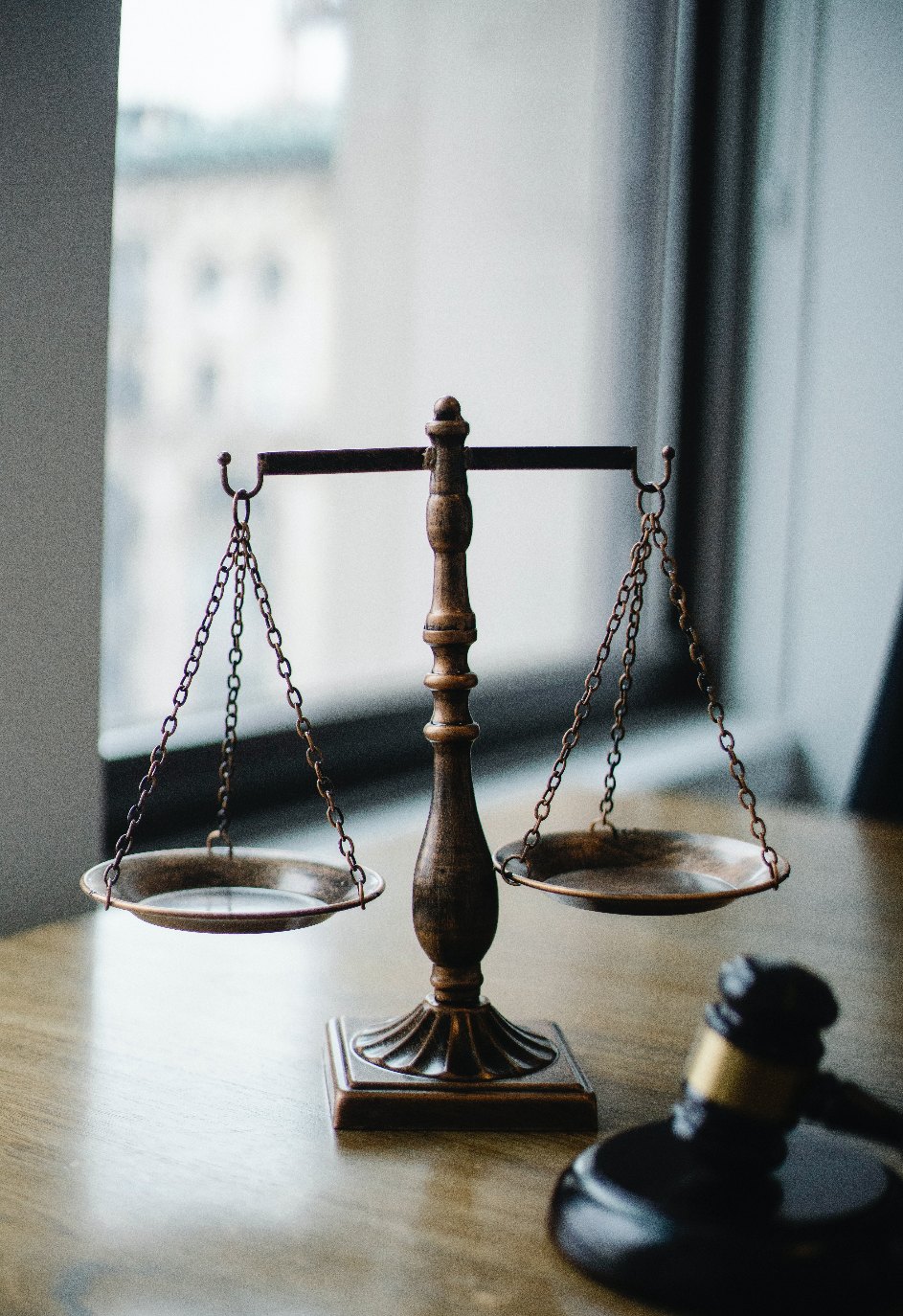 a photo of scales used to represent the balance of law